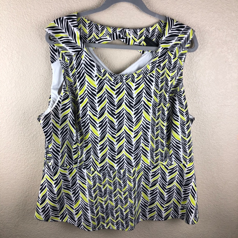 Peplum tank with cut out on back